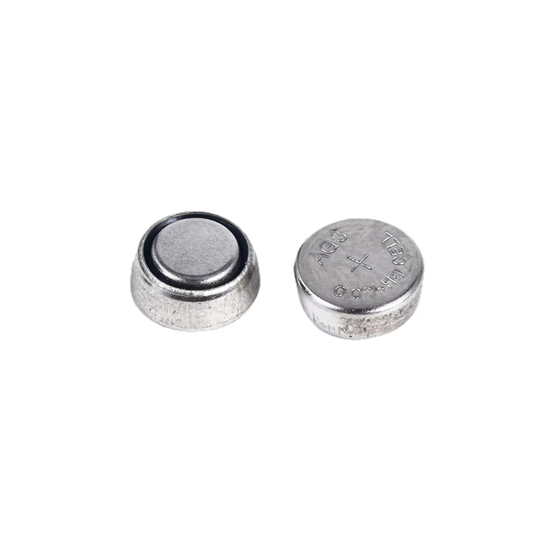 Detailed view of button cell batteries highlighting size and chemistry differences